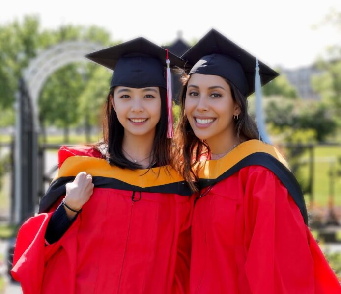 Shows Alice Chiu and Maryam AlBahar at graduation