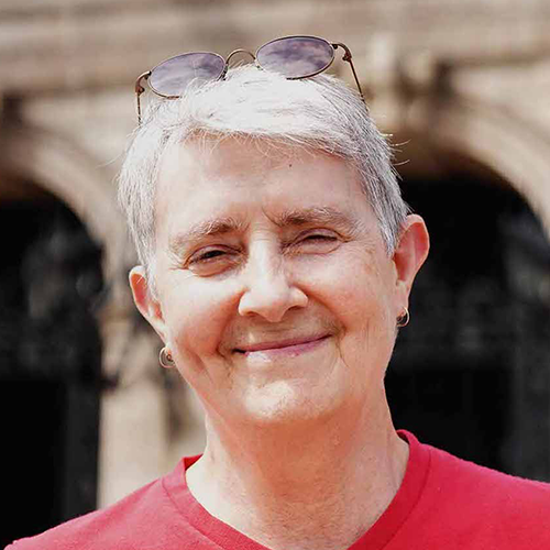 Shows Lynn Brown head and shoulders only, wearing red shirt