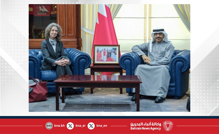 Dean Penny Bishop sits to the left of Dr. Mohammed in Mubarak Juma, Minister of Education