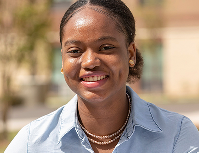 Headshot of Honour Adewumi.