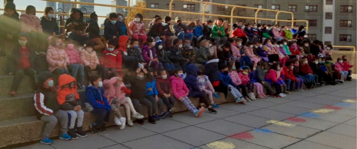 Children on a playground at a school in Boston's Chinatown
